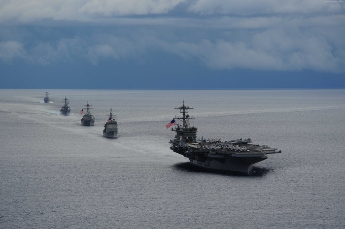 USS Theodore Roosevelt aircraft carrier leads a naval convoy