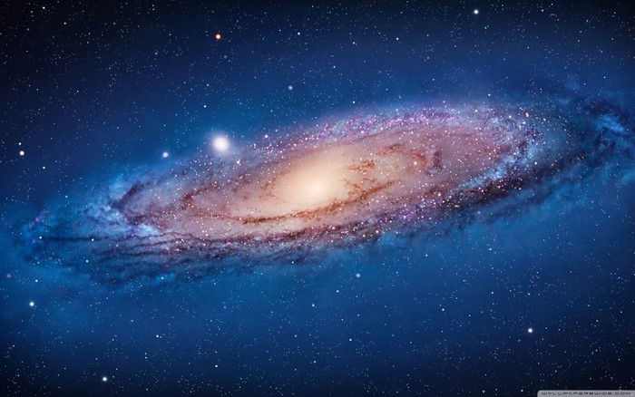 Spiral galaxy in deep space with stars