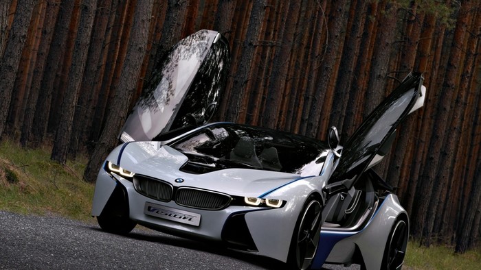 BMW Vision concept car with doors open in forest