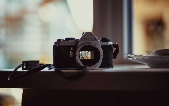 Pentax K1000 film camera on a table