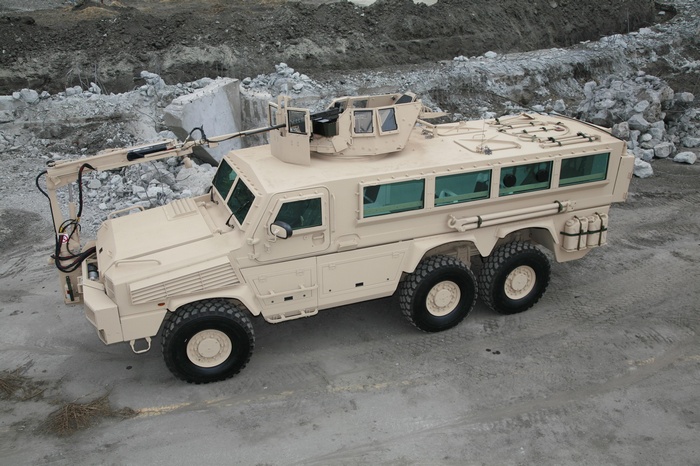 BAE Systems RG-33L MRAP with crane in construction site