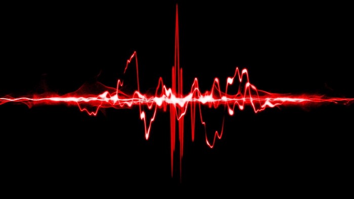 Abstract red sound wave illustration on black background
