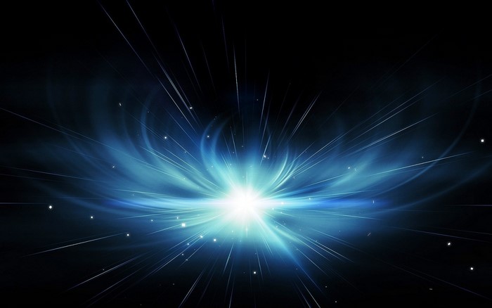 Abstract blue light explosion in darkness