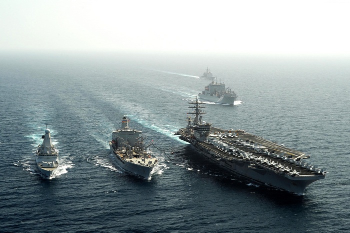 USS Dwight D. Eisenhower aircraft carrier with escort ships at sea