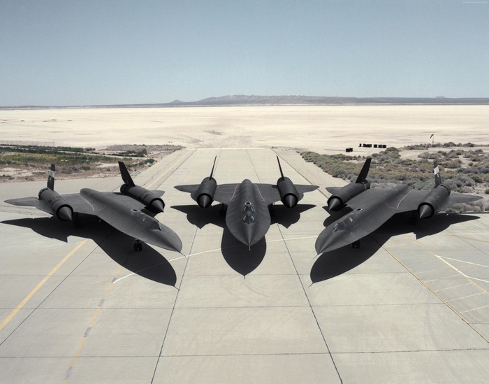 Three Lockheed SR-71 Blackbird aircraft on a runway