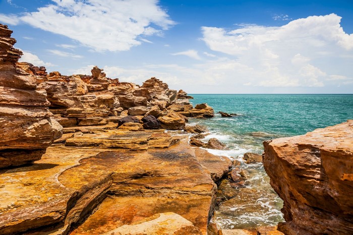 Rocky coast with turquoise ocean under a blue sky