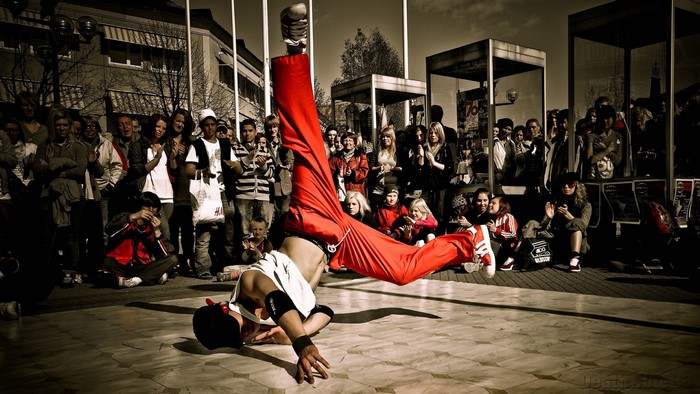 Breakdancer performs for a crowd