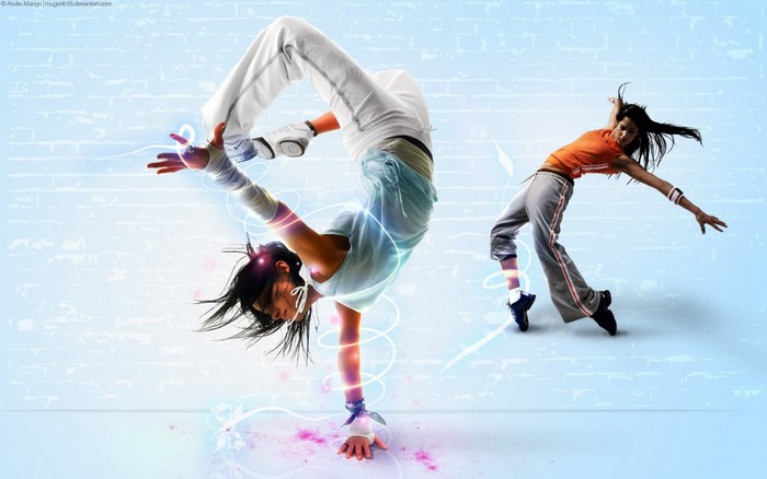 Two dancers performing in a digitally enhanced environment