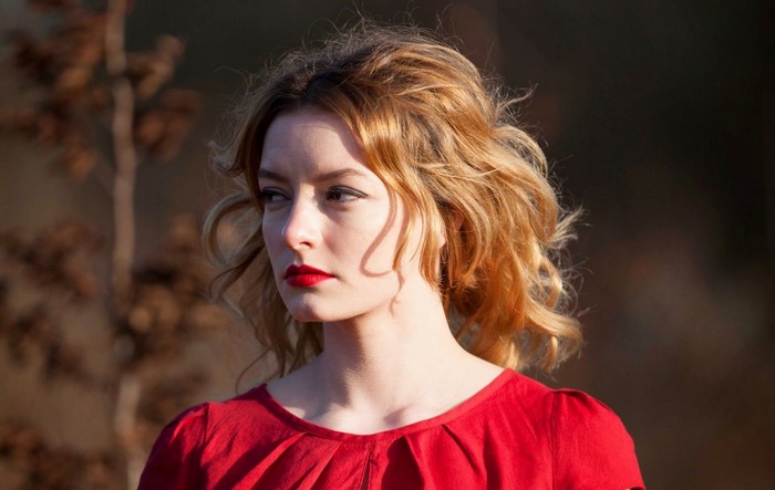 Woman with red lipstick and red dress