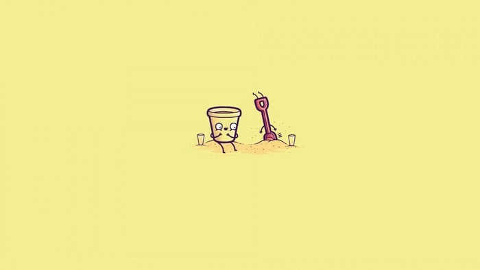 Cartoon bucket and shovel in sand