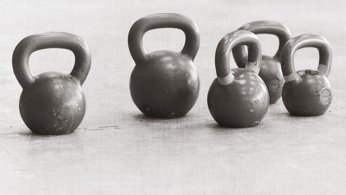 Group of kettlebells on a floor