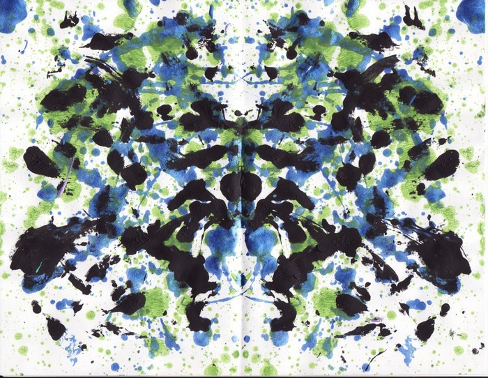 Symmetrical ink splatter Rorschach test pattern