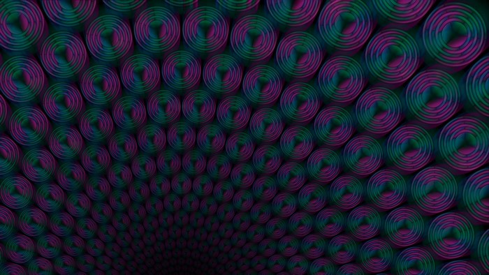 Abstract pattern of concentric circles in purple and green