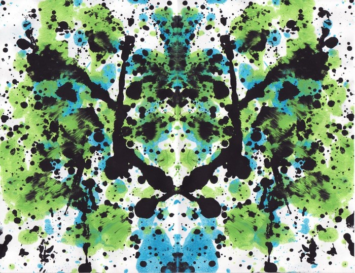 Symmetrical paint splatter Rorschach test