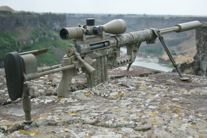 CheyTac Intervention .408 sniper rifle on rocks