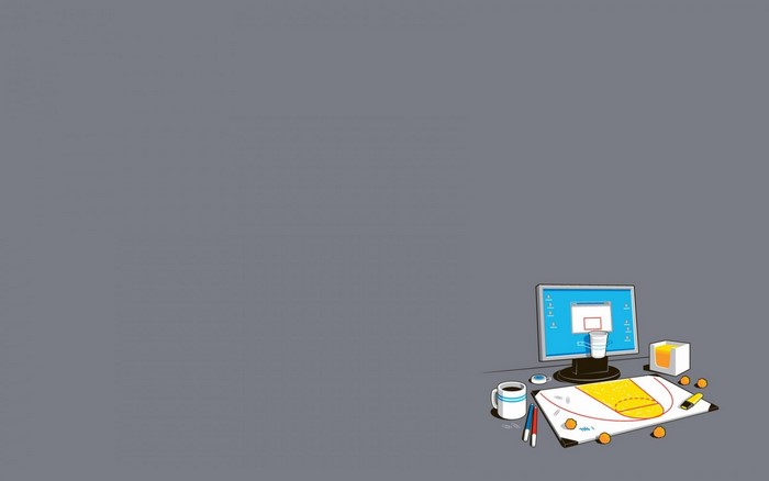 Minimalist desk setup with computer and basketball court diagram