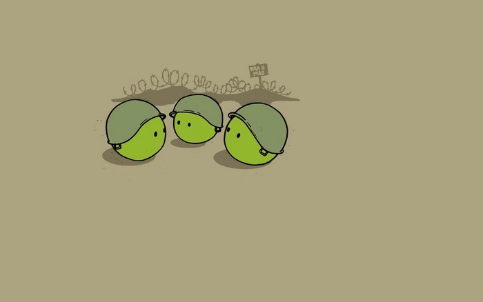 Three peas in military helmets with barbed wire