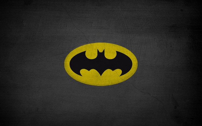 Batman logo on a dark textured background