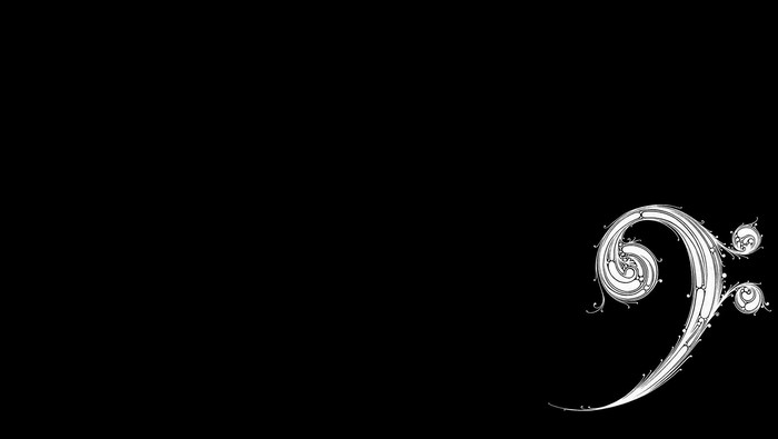 Ornate Bass Clef Symbol on Black Background