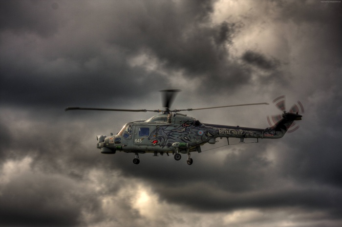 Royal Navy AgustaWestland AW139 helicopter in clouds