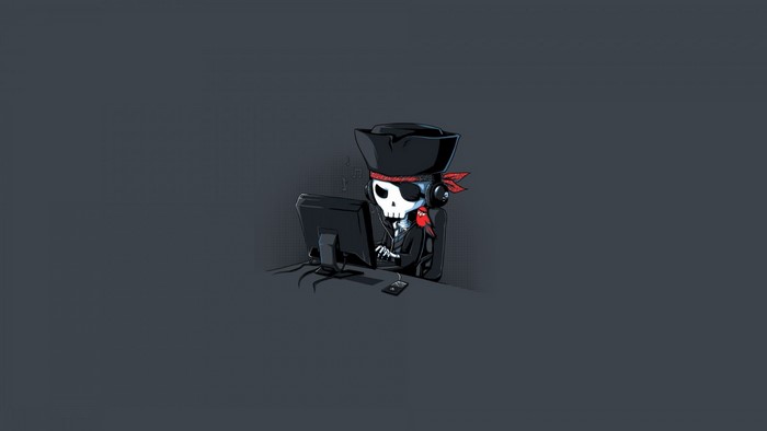Skeleton pirate at computer