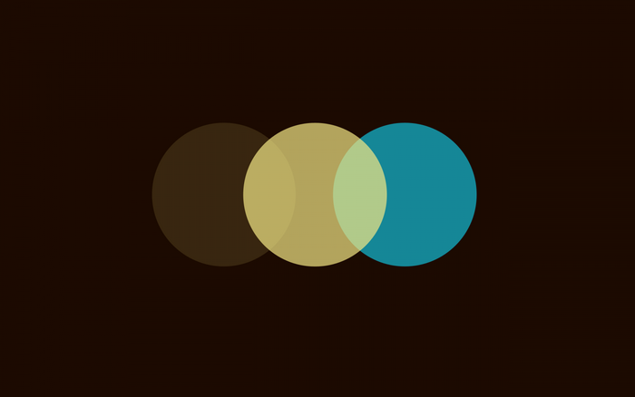 Three overlapping circles on a dark background
