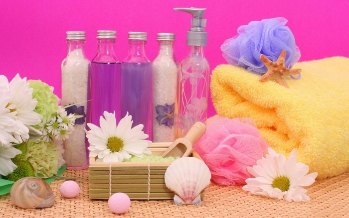 Spa products with flowers and shells