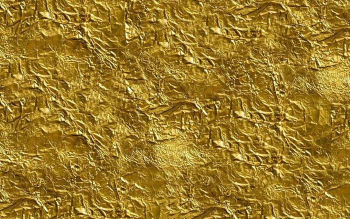 Gold foil texture with wrinkles and creases