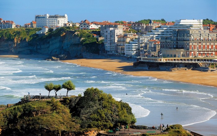 Coastal town with beach and ocean waves