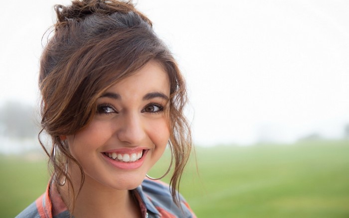 Rebecca Black smiling outdoors