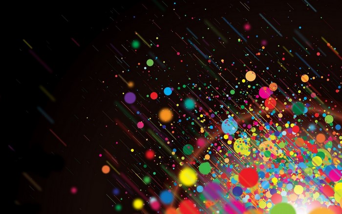 Abstract colorful circles and streaks on black background