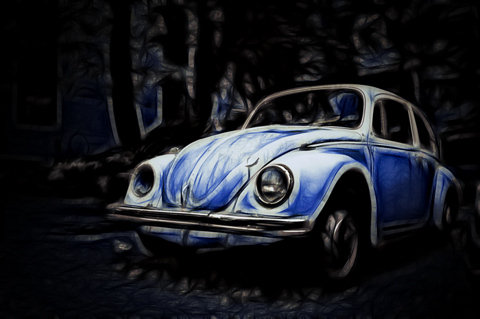 Blue and white Volkswagen Beetle parked outdoors