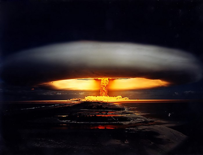Nuclear explosion over water at night