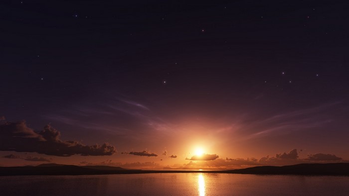 Sunset over water with stars