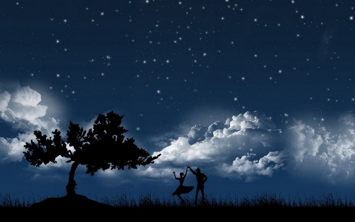 Couple dancing under starry night sky with clouds and tree