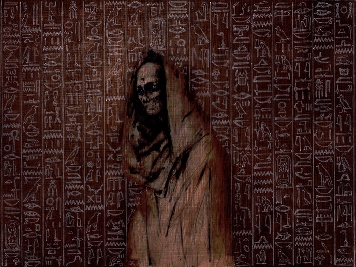 Mummy figure in front of Egyptian hieroglyphs