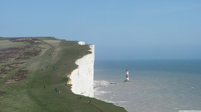 White cliffs and lighthouse on the coast