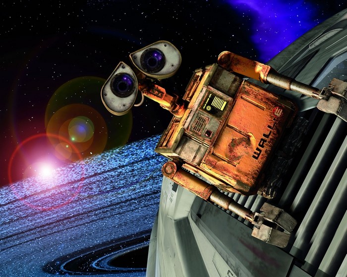WALL-E in outer space with a ringed planet