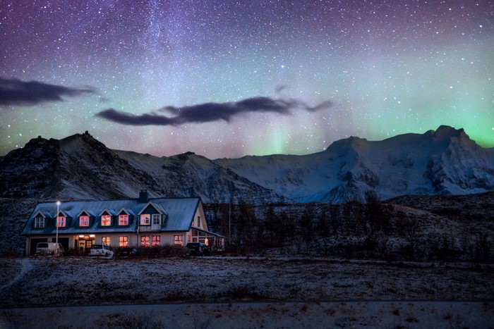 House under Aurora Borealis in Iceland