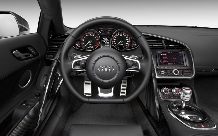 Audi R8 sports car interior dashboard and steering wheel