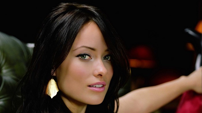 Olivia Wilde portrait with gold earrings