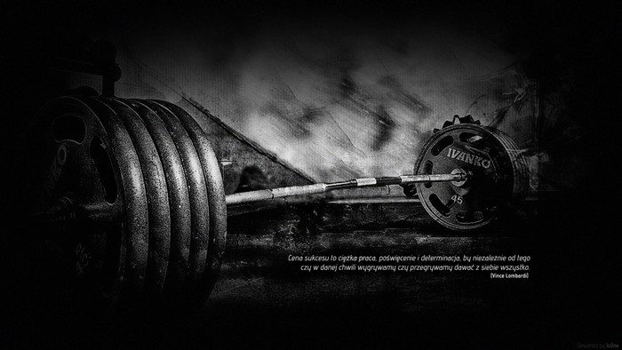 Barbell with weights and quote