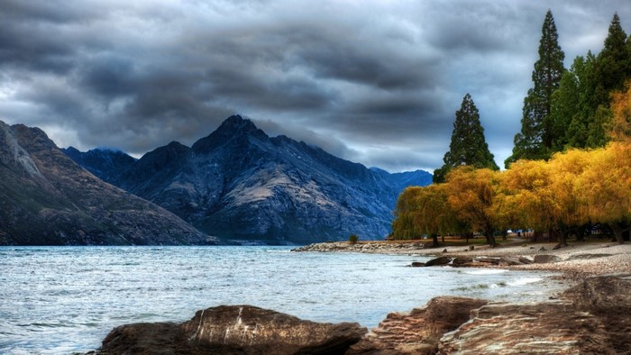 Lake and mountains with autumn trees