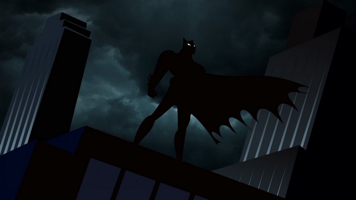 Batman from Batman The Animated Series on a Gotham City rooftop