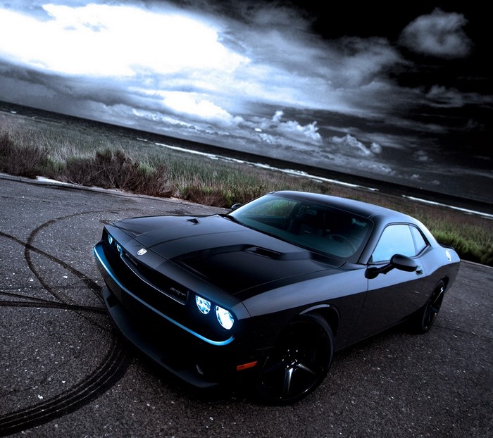 Black Dodge Challenger SRT on a road