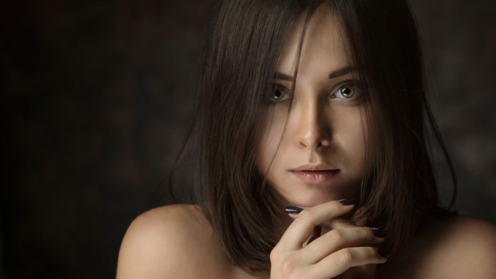 Portrait of a young woman with brown hair