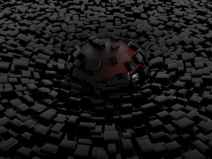 Abstract sphere surrounded by black cubes