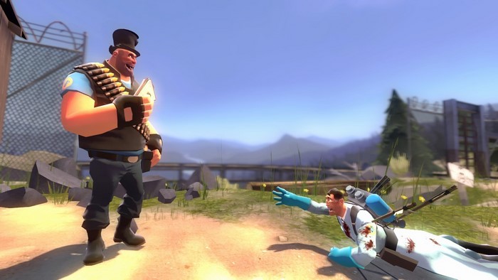Heavy from Team Fortress 2 with a fallen Medic