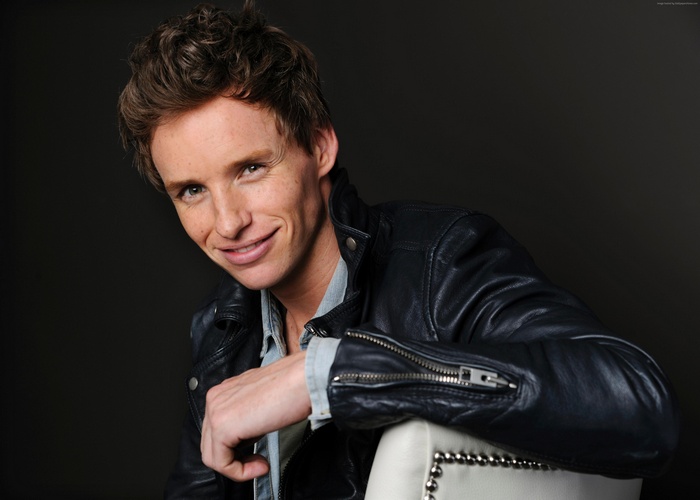 Eddie Redmayne in a black leather jacket
