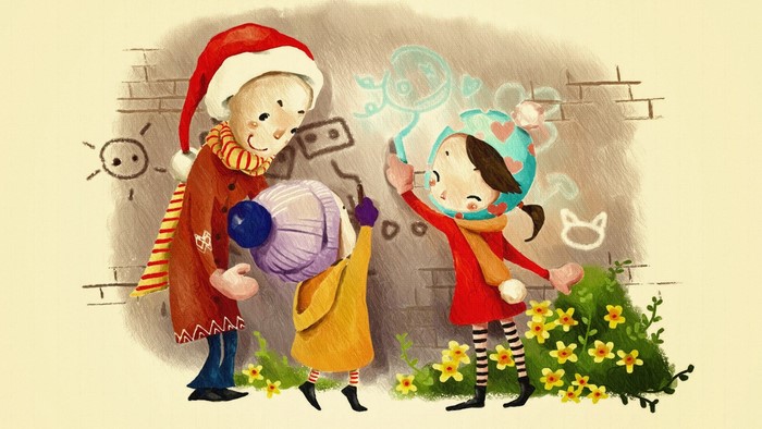Children drawing on a brick wall with Christmas theme
